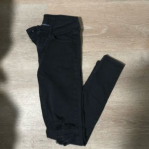 Distressed knee American eagle next level stretch in black